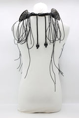 BIG CARVED COCONUT SHELL NECKLACE WITH LEATHERETTE FRINGE